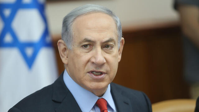 Netanyahu, juggling five government positions. (Photo: Alex Kolomisky)