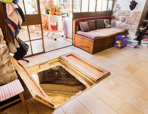 Entrance to the mikveh seen in the couple's living room (Photo: Assaf Peretz/Israel Antiquities Authority)