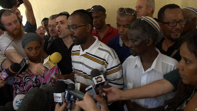 Abera Mengistu's family speaks to reporters (Photo: Avi Rokach)