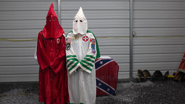 The Ku Klux Klan. Cross is a former senior member. (Photo: Reuters) (צילום: רויטרס) The Ku Klux Klan. Cross is a former senior member. (Photo: Reuters)