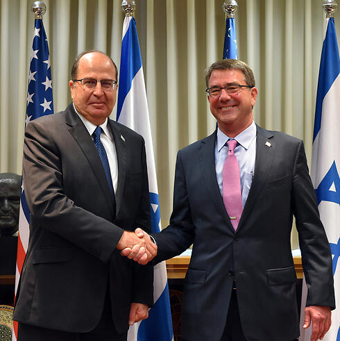 Carter (right) greeted by Defense Minister Ya'alon upon his arrival in Israel. (Photo: Ministry of Defense) (צילום: אריאל חרמוני, משרד הביטחון) Carter (right) greeted by Defense Minister Ya'alon upon his arrival in Israel. (Photo: Ministry of Defense)