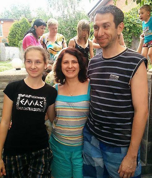 Alika Pak and her family at the camp. 'Patriotism, unity, army, culture and the fact that every person can find his place are they things I like about Israel' (Photo: Tali Farkash) (צילום: טלי פרקש) Alika Pak and her family at the camp. 'Patriotism, unity, army, culture and the fact that every person can find his place are they things I like about Israel' (Photo: Tali Farkash)