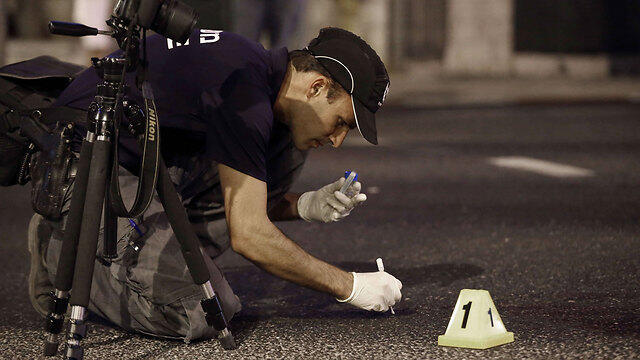 Police at the scene of the crime (Photo: AFP)