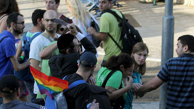 Shlissel attacks marchers at the Jerusalem Pride Parade (Photo: Reuters)