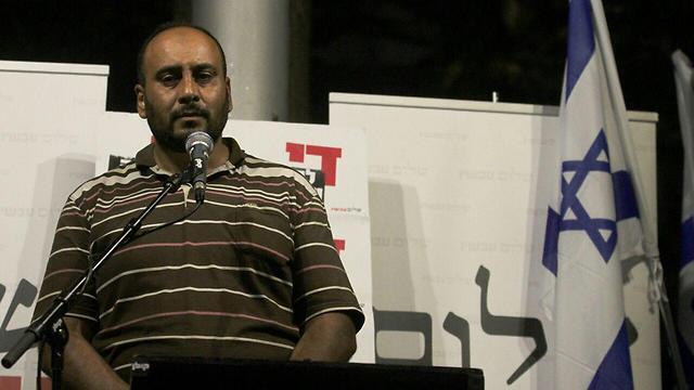 Nasser Dawabsheh speaking at the rally in Rabin Square (Photo: Ido Erez)