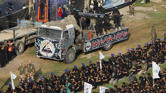 Hamas shows off its weapons during a graduation ceremony for young members of its military wing in Gaza (Photo: Reuters)
