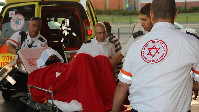 Allaan being brought to Barzilai Medical Center 