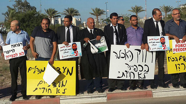 The Arab lawyers protesting outside the hospital.nullnull The Arab lawyers protesting outside the hospital.