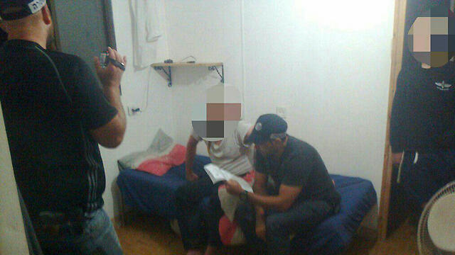 An administrative restraining order being given to a right-wing activist (Photo: Honenu)