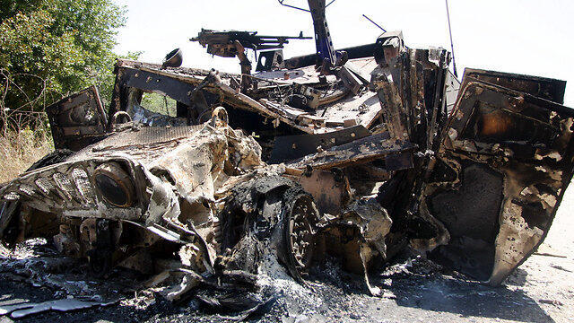 Сожженный "хаммер". Фото: Гиль Нехоштан