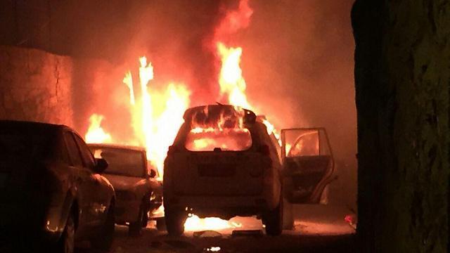 The border police vehicle after being hit by the firebomb
