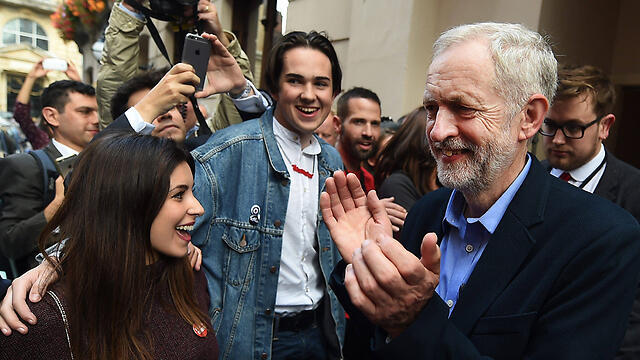 Jeremy Corbyn celebrates (Photo: EPA)