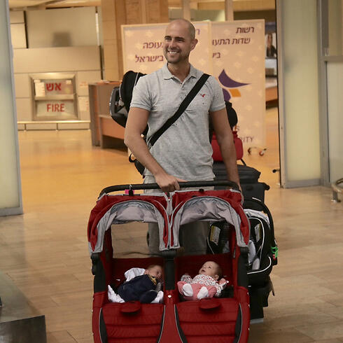 Incoming MK Amir Ohana with his twins born of a surrogate mother in the US (Photo: Motti Kimchi)