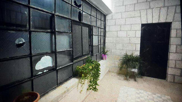 The damaged house in Beitin.