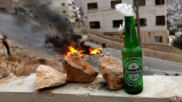 Firebombs in Nablus. (Photo: EPA)