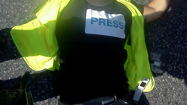 Attacker in press disguise 