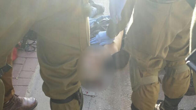 The terrorist after he's been neutralized in Hebron.