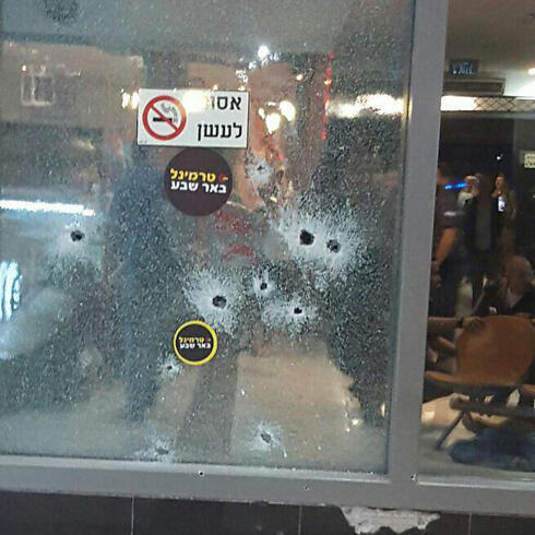 Bullet holes at the scene of the attack,