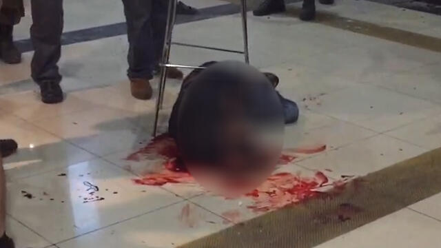 Zarhum wounded on the ground after being assaulted