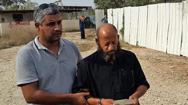 Khalil al-Okbi claims his son was executed.