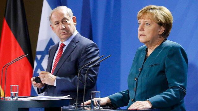 Netanyahu in Berlin with Chancellor Angela Merkel (Photo: Reuters)