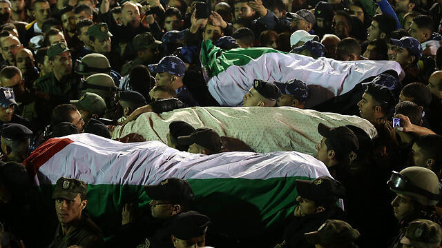 Bodies of terrorists returned by Israel (Photo: EPA) (צילום: EPA) Bodies of terrorists returned by Israel (Photo: EPA)