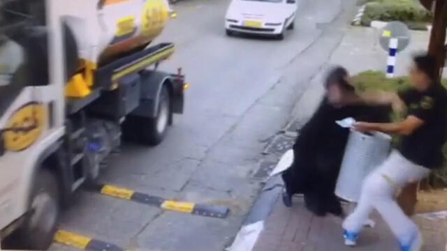 Still from video of the attack in Beitar Illit
