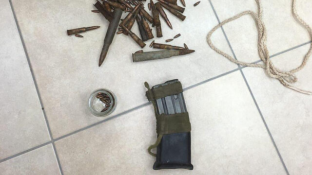 Gun magazine and bullets found at the home of a youth suspected of attacking Rabbi Arik Ascherman (Photo: Police Spokesperson's Department) (צילום: חטיבת דובר המשטרה) Gun magazine and bullets found at the home of a youth suspected of attacking Rabbi Arik Ascherman (Photo: Police Spokesperson's Department)