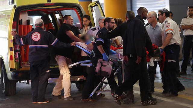 The wounded soldier being evacuated to hospital (Photo: Gil Yohanan)