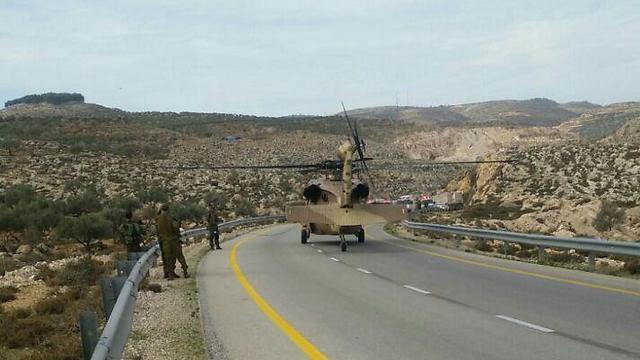 A rescue helicopter at the scenenullnull A rescue helicopter at the scene