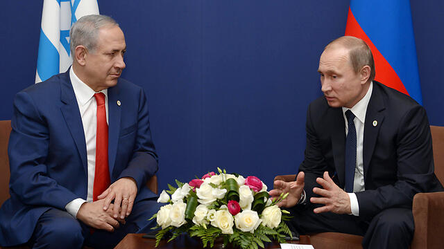 Netanyahu and Putin in their last meeting in Paris (Photo: Amos Ben Gershom, GPO)