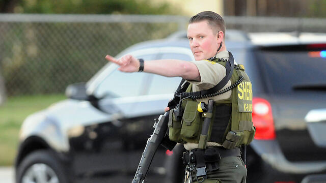 Police at the scene (Photo:AP)