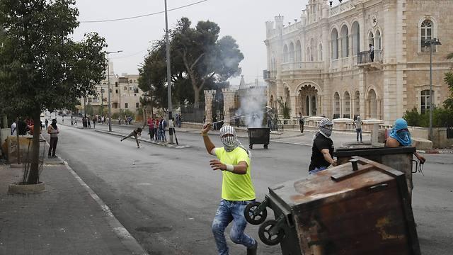 Rioting outside the Jacir Palace hotel in Bethlehem (Photo: AP) (Photo: AP) Rioting outside the Jacir Palace hotel in Bethlehem (Photo: AP)