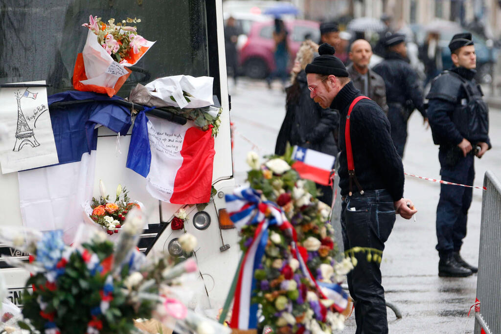 A man pays tribute outside the Bataclan concert hall in Paris following the Nov. 13, 2015, terrorist attacks (Photo: Reuters) A man pays tribute outside the Bataclan concert hall in Paris following the Nov. 13, 2015, terrorist attacks