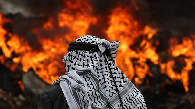 Clashes between Palestinians and Israeli security forces in Kfar Qaddum near Nablus (Photo: AFP) (צילום: AFP) Clashes between Palestinians and Israeli security forces in Kfar Qaddum near Nablus (Photo: AFP)