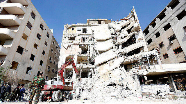 The building bombed in Jaramana in Syria, where Kuntar was hiding (Photo: EPA) (צילום: EPA) The building bombed in Jaramana in Syria, where Kuntar was hiding (Photo: EPA)