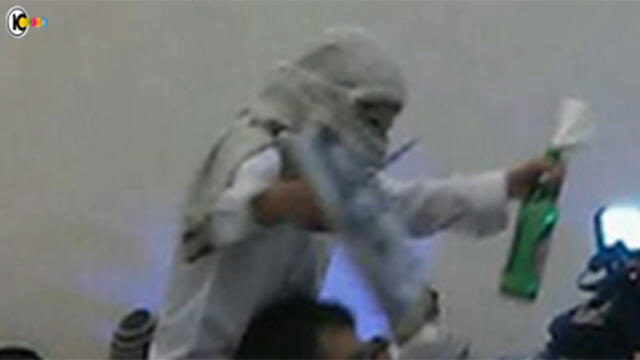 Still showing guest with Molotov cocktail (Photo courtesy of Channel 10)