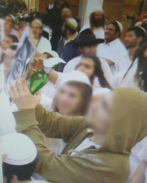 Stabbing a picture of  Ali Dawabsheh.