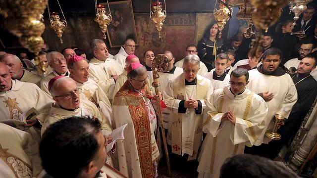Midnight mass at the Church of the Nativity (Photo: Reuters)