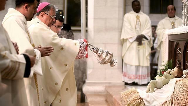 Midnight mass at the Church of the Nativity (Photo: Reuters)