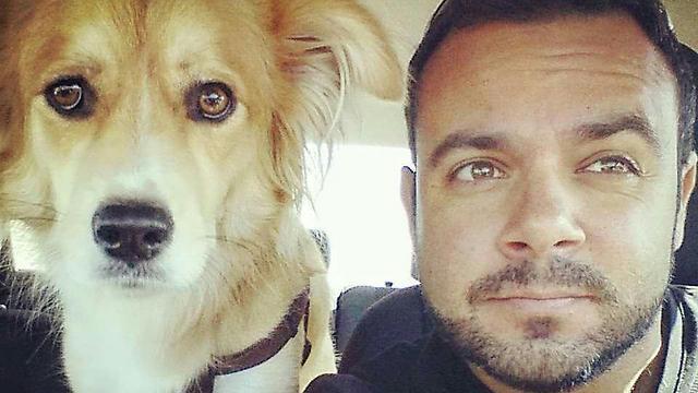 Ido Luzon with his dog, Django