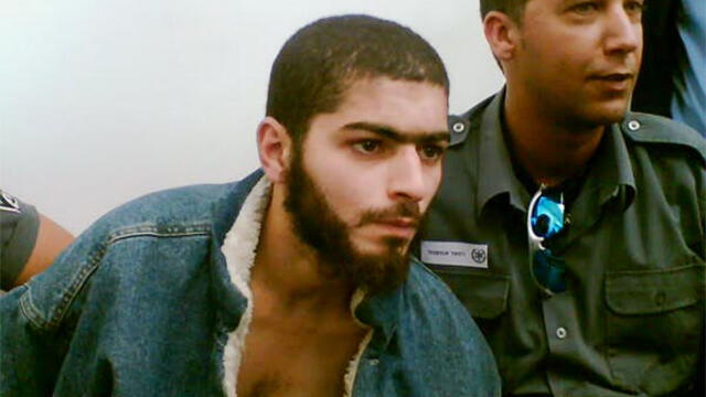 The suspect in the Tel Aviv shooting during a previous arrest (Photo: Raanan Ben Zur)