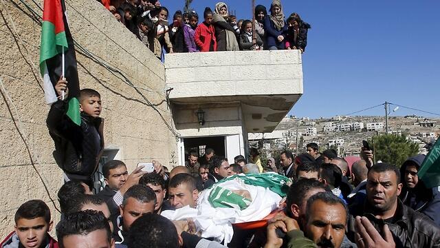 Palestinian funeral near Hebron (Photo: Reuters) nullnull Palestinian funeral near Hebron (Photo: Reuters)