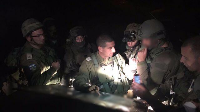 Security forces at the scene of the Otniel attack 