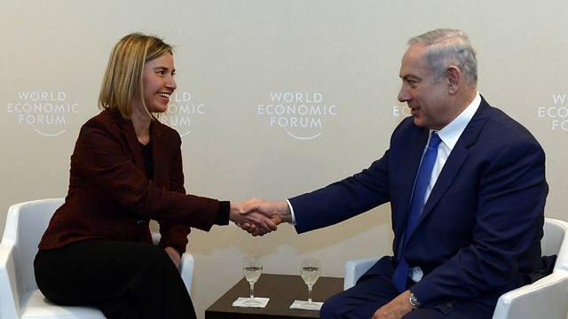Mogherini and Netanyahu meet in Davos on the sidelines of the World Economic Forum (Photo: Haim Tzah, GPO) (צילום: חיים צח, לע"מ) Mogherini and Netanyahu meet in Davos on the sidelines of the World Economic Forum (Photo: Haim Tzah, GPO)