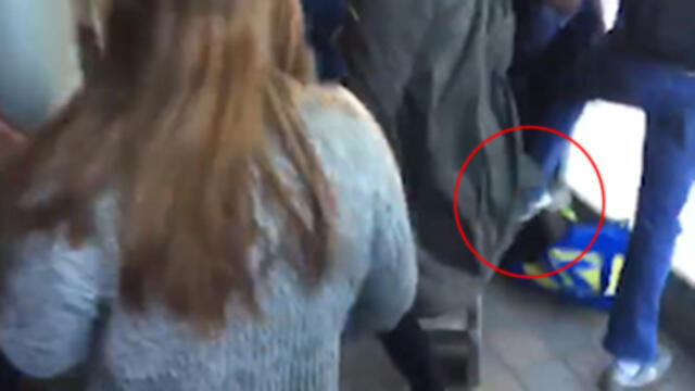 Pinning the attacker to the ground.