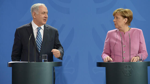 Netanyahu and Merkel (Photo: amos Ben Gershom/GPO)