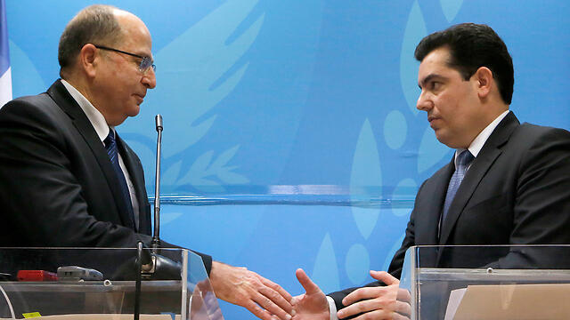 Defense Minister Moshe Ya'alon on a visit to Cyprus (Photo: AP) (צילום: AP) Defense Minister Moshe Ya'alon on a visit to Cyprus (Photo: AP)