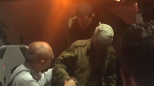 Wounded soldiers being taken to hospital (Photo: Rotem Elizera)