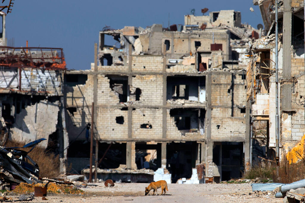 Residential areas devastated in fighting in Homs, Syria 